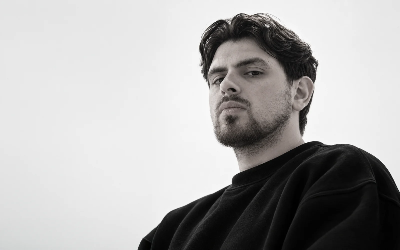 Alain Tural, monochrome landscape portrait on a light background